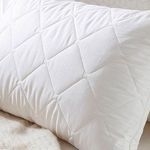 Стеганые подушки: их виды и особенности